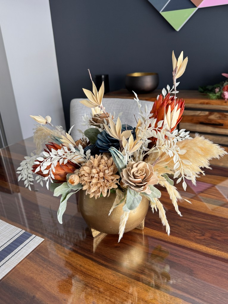 small faux flower centrepiece decor in gold vase